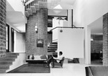 Achyut Kanvinde. Kanvinde Residence, New Delhi, India. 1965–67. Interior view, with the architect seated at center. c. 1966. Photograph: Madan Mahatta. Courtesy of the Kanvinde Rai &amp; Chowdhury Archives, Madan Mahatta Archives, and PHOTOINK