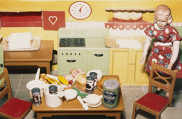 Laurie Simmons. Blonde/Red Dress/Kitchen, from the series Interiors. 1978. Silver dye bleach print, 3 1/4 × 5&#34; (8.3 × 12.7 cm). Joel and Anne Ehrenkranz Fund