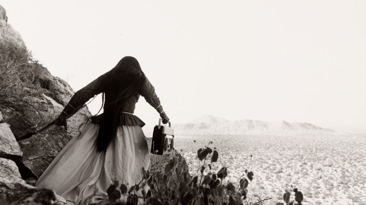 Graciela Iturbide. Mujer ángel, Desierto de Sonora (Angel Woman, Sonoran Desert). 1979. Gelatin silver print, printed 1986, 8 × 11 7/8&#34; (20.4 × 30.3 cm). Purchase