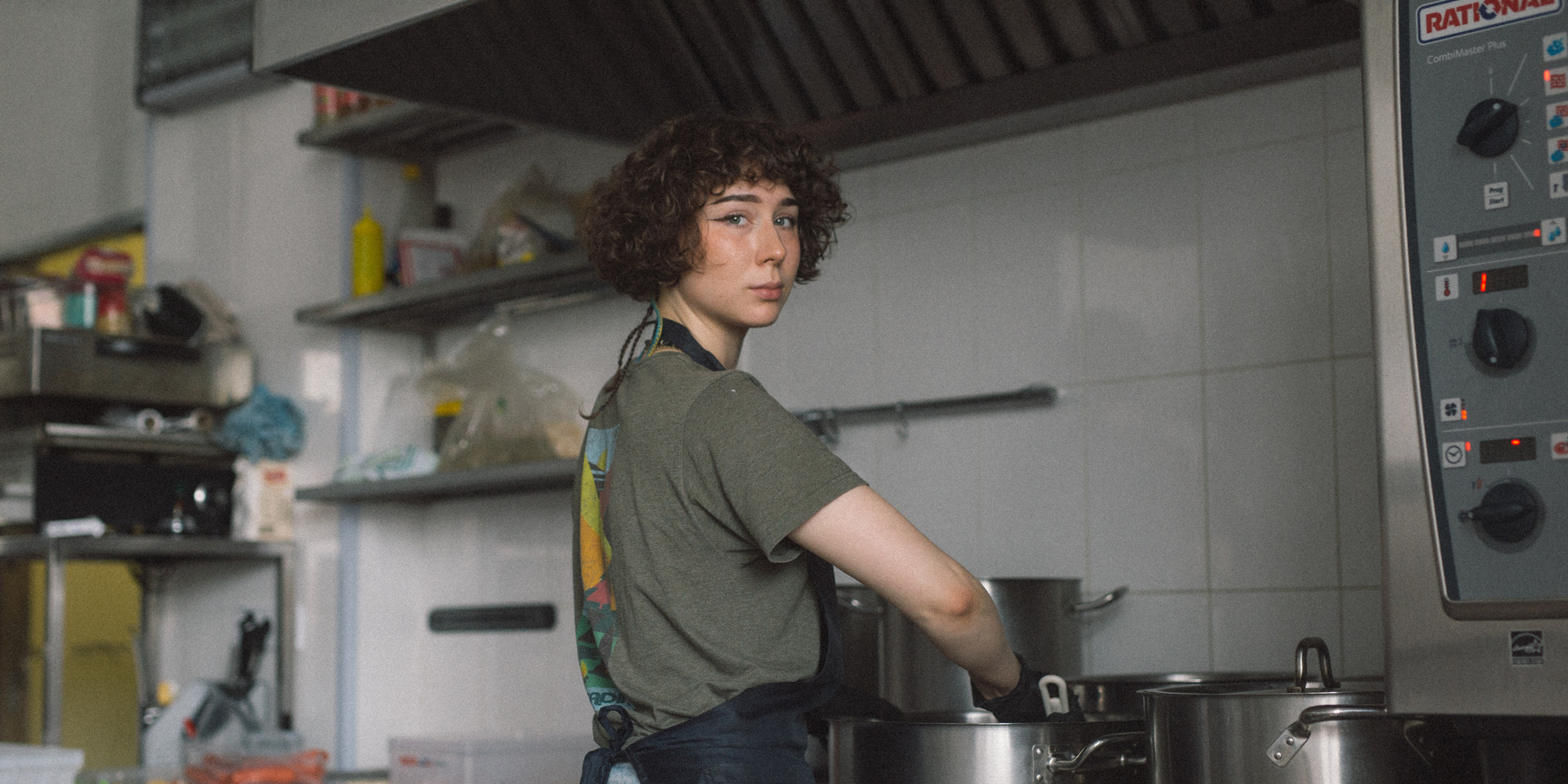 An LGBTQ+ volunteer preparing food for refugees and soldiers in Kyiv. Photo courtesy UKRAINEPRIDE. Photo: Kostiantyn Bibliuk