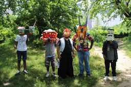 Everette Ball, Diogeneis Costa, Christopher Chronopoulus, Jimmy Tucker, Leroy Pettaway. Monster Mash. 2022. Mixed media. Photo: Mallory Perry. Shown: A photograph of five artists standing in a New York City park wearing colorful monster masks