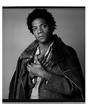 Richard Corman. Photograph of Jean-Michel Basquiat for L’Uomo Vogue. New York City, 1984. Gelatin Silver Print, 20 × 16” (50.8 × 40.64 cm)