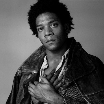 Richard Corman. Photograph of Jean-Michel Basquiat for L’Uomo Vogue. New York City, 1984. Gelatin Silver Print, 20 × 16” (50.8 × 40.64 cm)