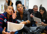 Family Programs. 2012. Digital Image © The Museum of Modern Art, New York. New York Photo: Martin Seck Image description: Families comparing a handout to a work of art during a Family Gallery Talk. Photo: Martin Seck