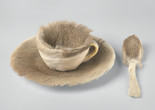 Meret Oppenheim. Object (Objet). 1936. Fur-covered cup, saucer, and spoon. Cup 4 3/8″ (10.9 cm) in diameter; saucer 9 3/8″ (23.7 cm) in diameter; spoon 8″ (20.2 cm) long, overall height 2 7/8″ (7.3 cm).The Museum of Modern Art, New York. Purchase