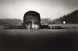 Gordon Parks. Emerging Man, Harlem, New York. 1952. Gelatin silver print, 8 7/16 x 12 7/8&#34; (21.4 x 32.7 cm). Acquired through the generosity of The Friends of Education of The Museum of Modern Art and Committee on Photography Fund. © 2017 Gordon Parks Foundation