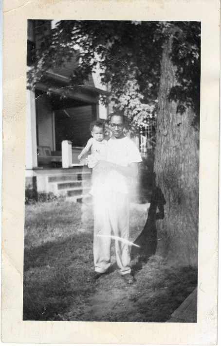 Linda Goode Bryant, age one, with her father, Floyd N. Goode, Columbus, Ohio, 1950