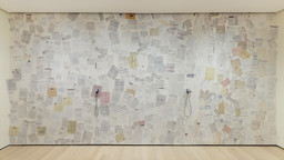Installation view of wallpaper showing past-due bills issued to Just Above Midtown in the exhibition Just Above Midtown: Changing Spaces (September 10, 2022–February 18, 2023). Photograph by Emile Askey