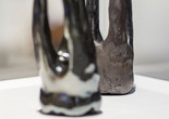 Untitled. 2022. Clay. Courtesy of BLACK BEYOND Image Description: Ceramic sculptures resembling teeth crafted by artist Anastasia Warren sit on a white surface.