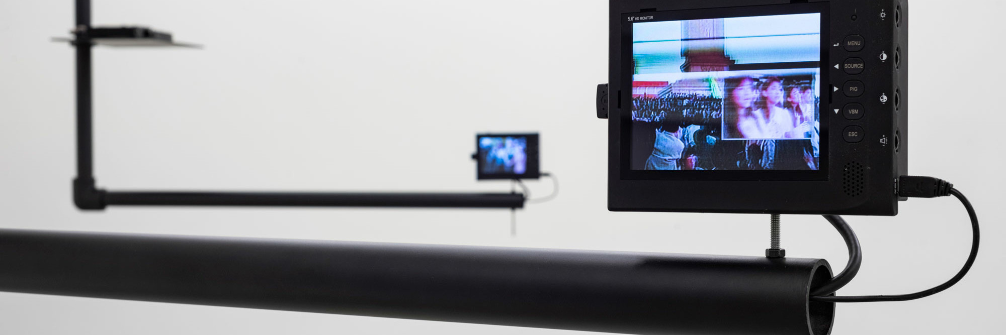 Dara Birnbaum. Tiananmen Square: Break-In Transmission. 1990. Five-channel color video, four-channels of stereo sound, surveillance switcher, and custom-designed support system, dimensions variable. Installation view, Dara Birnbaum, Marian Goodman Gallery, London, November 8, 2018–January 12, 2019. © 2022 Dara Birnbaum. Courtesy of the artist and Marian Goodman Gallery