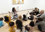 Participants discussing how lines make up places in a Family Gallery Talk. Photo: Martin Seck