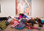Night Night at the Museum with Black Power Naps. The Museum of Modern Art, New York, January 20, 2023. Photo: Julieta Cervantes. Digital image ©️ 2023 The Museum of Modern Art. Shown: Pablo Picasso. Les Demoiselles d’Avignon. 1907. Oil on canvas, 8&#39; × 7&#39; 8&#34; (243.9 × 233.7 cm). The Museum of Modern Art. Acquired through the Lillie P. Bliss Bequest (by exchange). ©️ 2023 Estate of Pablo Picasso/Artists Rights Society (ARS), New York