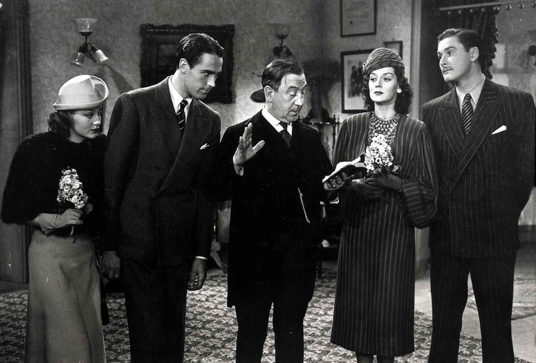 Four’s a Crowd. 1938. USA. Directed by Michael Curtiz. Courtesy of Alamy.