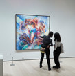Two visitors observing Umberto Boccioni's Dynamism of a Soccer Player. Photo: Gus Powell.