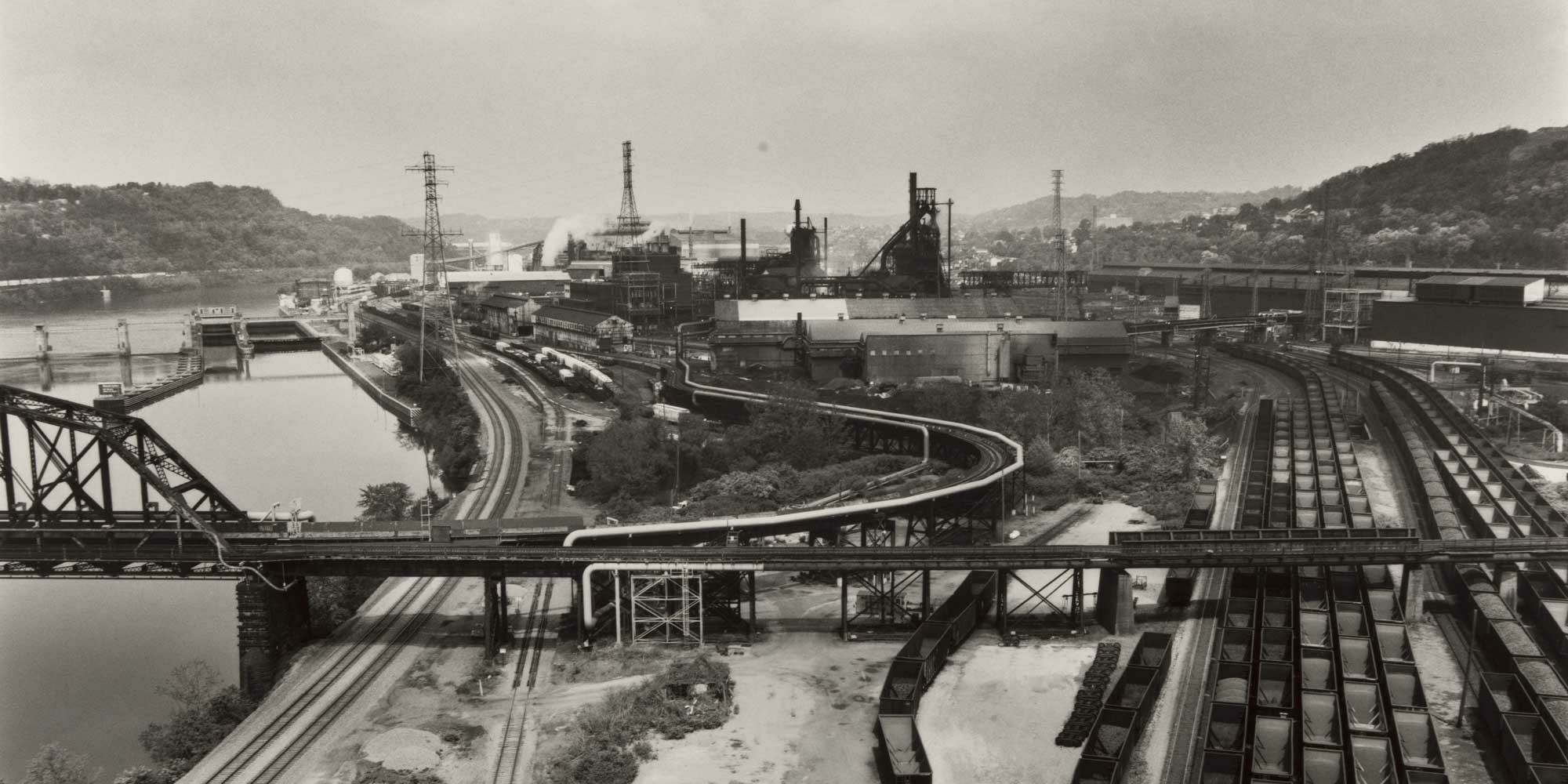 LaToya Ruby Frazier. U.S.S. Edgar Thomson Steel Works and Monongahela River. 2013. Gelatin silver print, 47 5/8 × 59 3/16" (121 × 150.3 cm). The Museum of Modern Art, New York. The Photography Council Fund. © 2023 LaToya Ruby Frazier