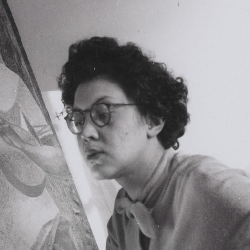 Charles White. Elizabeth Catlett in her studio. c. 1942. Black-and-white photograph, 3 5/8 × 3 9/16&#34; (9.2 × 9 cm). Private collection. © The Charles White Archives