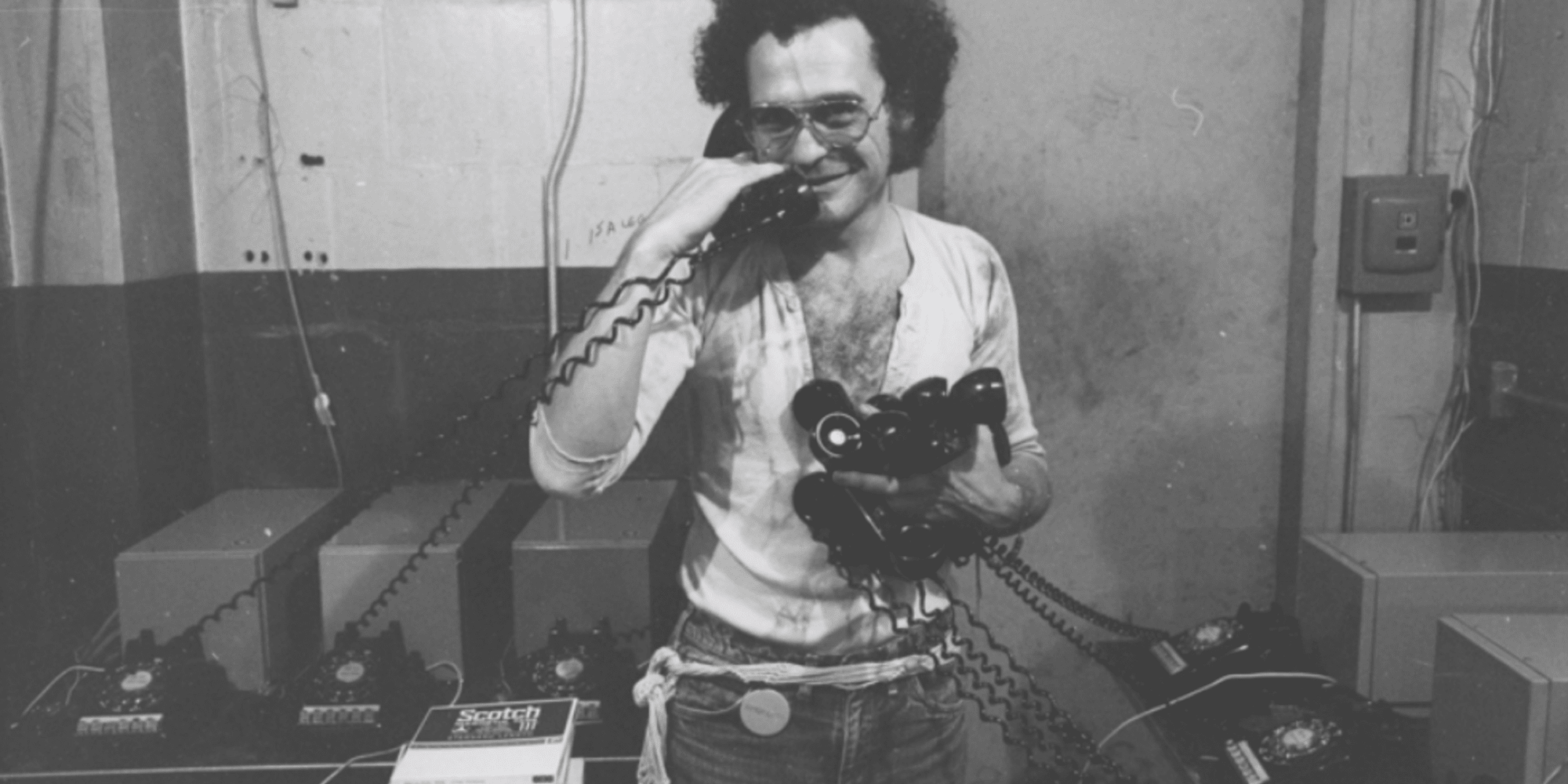 John Giorno with Dial-A-Poem telephones, c. 1969. Courtesy the John Giorno Foundation