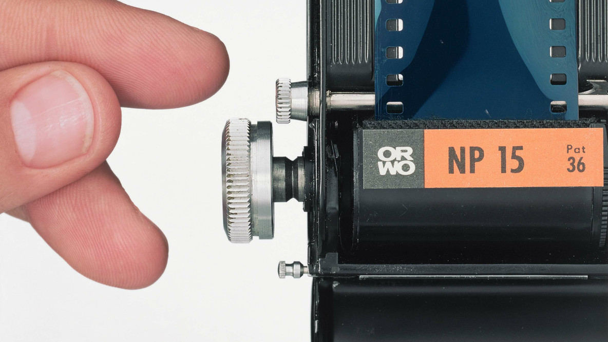 Christopher Williams. Fig. 2: Loading the film (ORWO NP15 135-36, ASA 25, Manufactured by VEB Filmfabrik Wolfen, Wolfen, German Democratic Republic), Exakta Varex IIa, 35 mm film SLR camera, Manufactured by Ihagee Kamerawerk Steenbergen, &amp; Co, Dresden, German Democratic Republic, Body serial no. 979625 (Production period: 1960–1963), Carl Zeiss Jena Tessar, 50mm f/2.8 lens, Manufactured by VEB Carl Zeiss Jena, Jena, German Democratic Republic, Serial no. 8034351 (Production period: 1967–1970), Model: Christoph Boland, Studio Thomas Borho, Oberkasseler Str. 39, Düsseldorf, Germany, June 25, 2012. 2012. Inkjet print, 17 1/2 × 21 1/2&#34; (44.5 × 54.6 cm). Acquired through the generosity of David Dechman and Michel Mercure in honor of Joel Wachs. © 2023 Christopher Williams