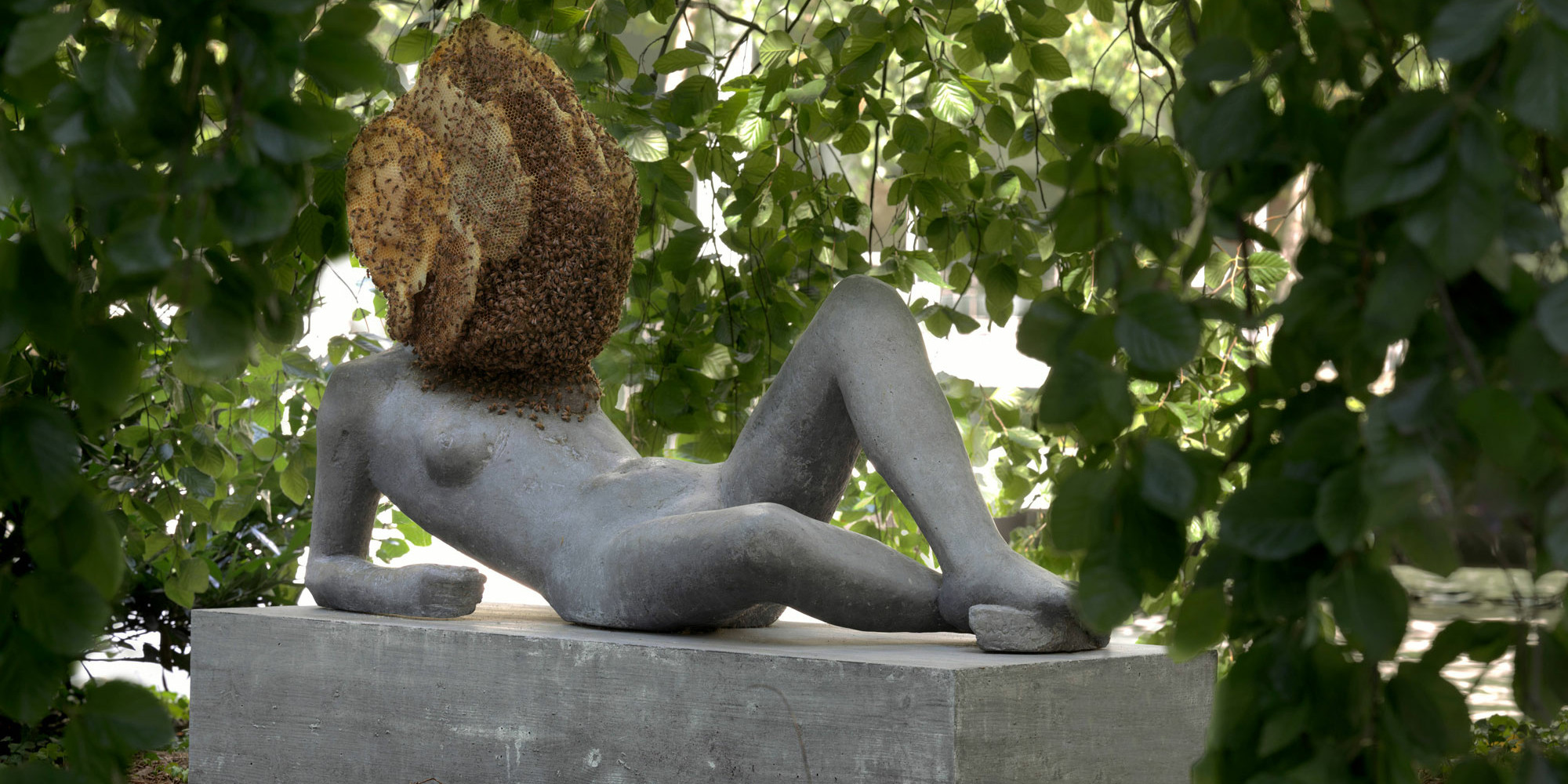 Pierre Huyghe. Untilled (Liegender Frauenakt). 2012. Concrete with beehive structure, wax, and live bee colony, figure 29 1/2 × 57 1/16 × 17 11/16" (75 × 145 × 45 cm); base 11 13/16 × 57 1/16 × 21 5/8" (30 × 145 × 55 cm); beehive dimensions variable. The Museum of Modern Art, New York. Committee on Painting and Sculpture Funds
