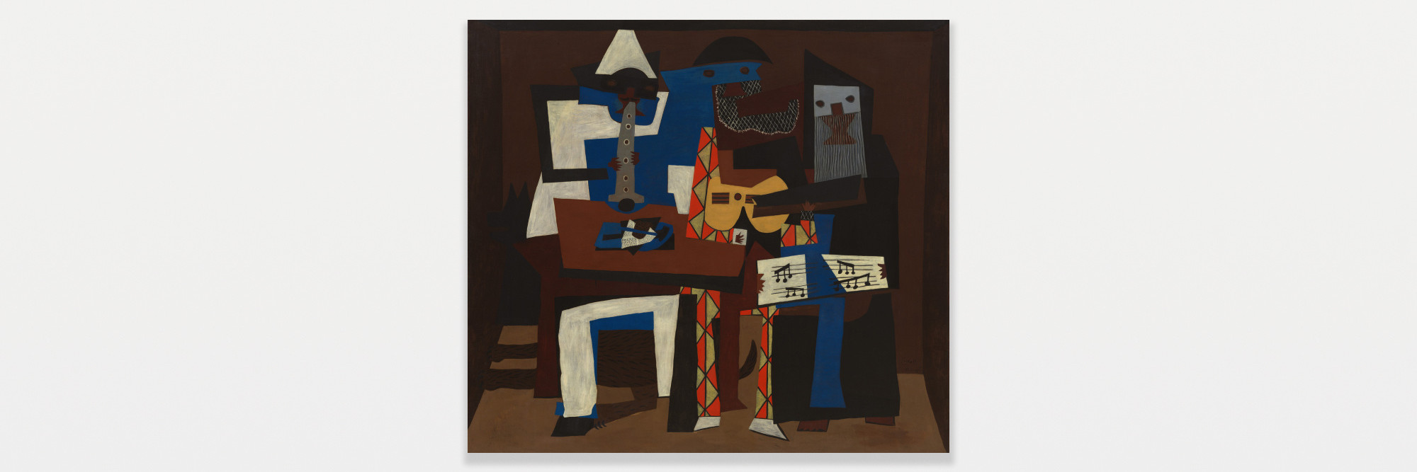 Pablo Picasso. Three Musicians. Fontainebleau, summer 1921. Oil on canvas, 6&#39; 7&#34; × 7&#39; 3 3/4&#34; (200.7 × 222.9 cm). Mrs. Simon Guggenheim Fund. © 2022 Estate of Pablo Picasso/Artists Rights Society (ARS), New York