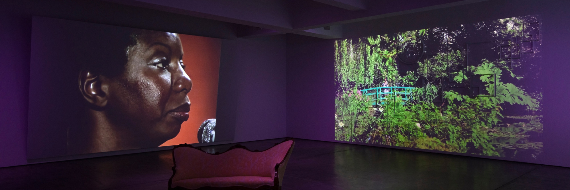 Ja’Tovia Gary. THE GIVERNY SUITE. 2019. Three-channel high-definition video and 16mm film transferred to high-definition video (black and white and color, stereo sound; 39:51 min.); settee; 25 painted frames; altar to Yemaya (candle, seashells, anchor, fruit, plate, vase, flowers, glass jar of molasses, glass jar of rum, and fabric); and altar to Oshun (candle, mirror, cowrie shells, fruit, cinnamon sticks, plate, vases, flowers, glass jar of white wine, glass jar of honey, and fabric), overall dimensions variable. The Museum of Modern Art, New York. Fund for the Twenty-First Century