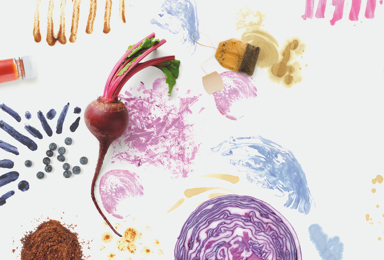 Photo: Image by ALSO, taken from “Art Making with MoMA: 20 Activities for Kids Inspired by Artists at The Museum of Modern Art,” published by The Museum of Modern Art, New York Image description: The top of a ketchup bottle on the left, several blueberries, with lines made from blueberry juice radiating out; a whole beet with greens in the middle of the image; a circle of coffee grounds on the bottom left; a used tea bag on the upper middle right; a cross-section of purple cabbage on the bottom. Various marks made from these food items spread throughout the image.