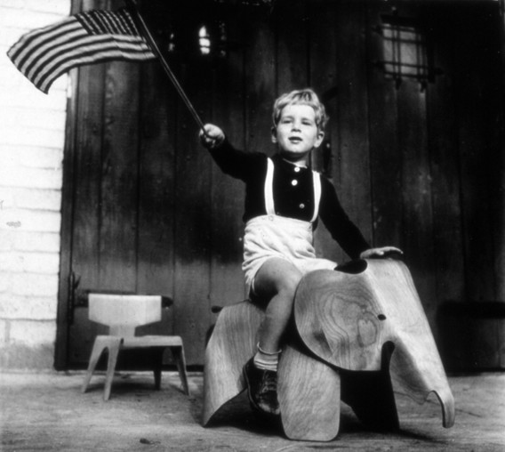 Herbert Matter’s son, Alexander “Pundy” Matter, on the Eames Molded Plywood Elephant in 1945