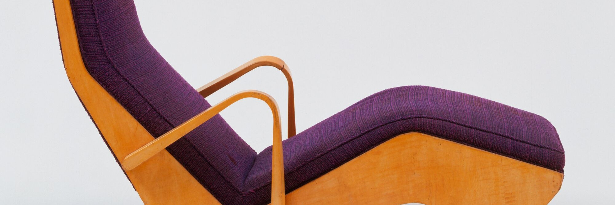 Marcel Breuer. Chaise Longue. 1938. Molded and cutout plywood and upholstery, 32 1/2 x 55 1/2 x 23 5/8&#34; (82.5 x 141 x 60 cm)