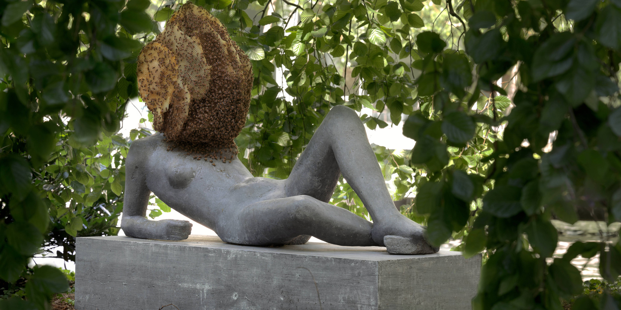 Pierre Huyghe. Untilled (Liegender Frauenakt). 2012. Concrete with beehive structure, wax, and live bee colony; figure 29 1/2 × 57 1/16 × 17 11/16" (75 × 145 × 45 cm), base 11 13/16 × 57 1/16 × 21 5/8" (30 x 145 x 55 cm), beehive dimensions variable. The Museum of Modern Art, New York. Committee on Painting and Sculpture Funds