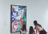 Image: Marc Chagall. I and the Village. 1911. Oil on canvas. The Museum of Modern Art, New York. Mrs. Simon Guggenheim Fund. © 2023 Artists Rights Society (ARS), New York/ADAGP, Paris Image description: A family talks about what they notice in the painting I and the Village by Marc Chagall