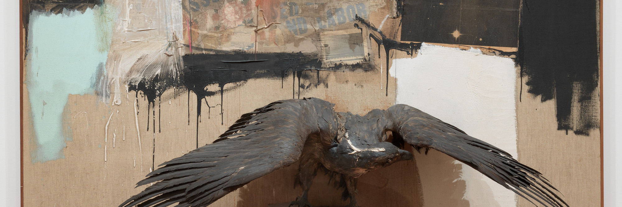 Robert Rauschenberg. Canyon. 1959. Oil, pencil, paper, metal, photograph, fabric, wood, canvas, buttons, mirror, taxidermied eagle, cardboard, pillow, paint tube and other materials, 81 3/4 × 70 × 24&#34; (207.6 × 177.8 × 61 cm). The Museum of Modern Art, New York. Gift of the family of Ileana Sonnabend. © 2023 Robert Rauschenberg Foundation