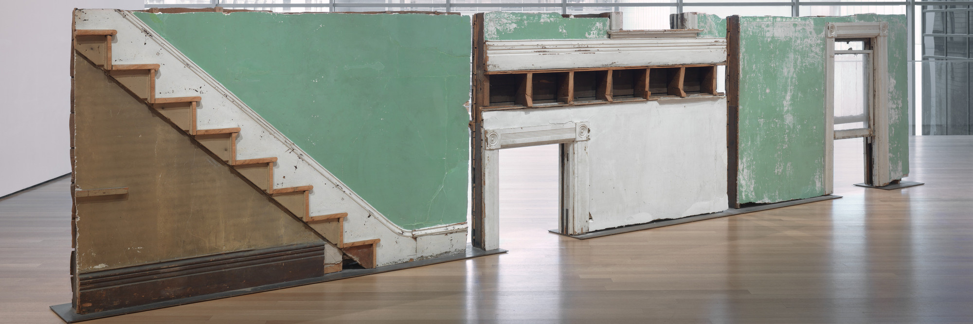 Gordon Matta-Clark. Bingo. 1974. Building fragments: painted wood, metal, plaster, and glass, three sections, overall 69&#34; × 25&#39; 7&#34; × 10&#34; (175.3 × 779.8 × 25.4 cm). The Museum of Modern Art, New York. Nina and Gordon Bunshaft Bequest Fund, Nelson A. Rockefeller Bequest Fund, and the Enid A. Haupt Fund. © 2023 Estate of Gordon Matta-Clark/Artists Rights Society (ARS), New York