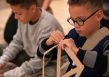 Photo: Manuel Martagon Image description: Participants exploring materials in a Family Gallery Talk