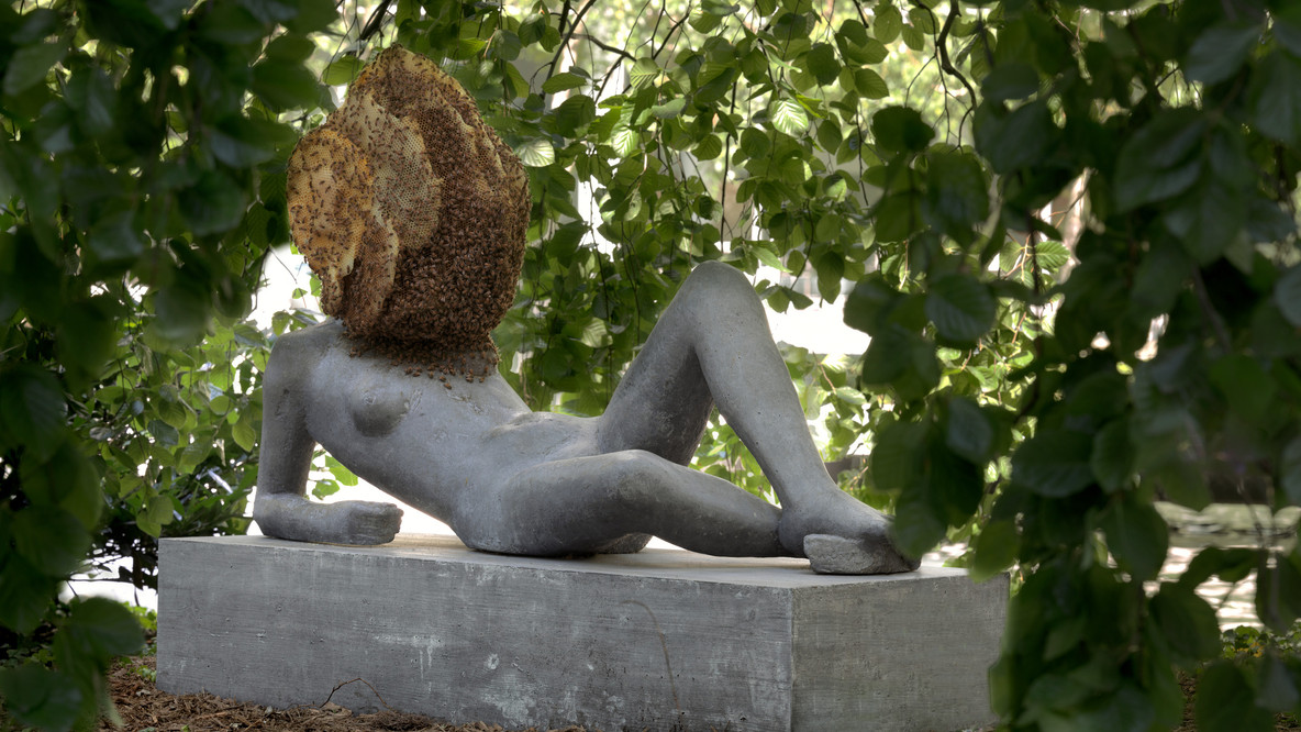 Pierre Huyghe. Untilled (Liegender Frauenakt). 2012. Concrete with beehive structure, wax, and live bee colony; figure 29 1/2 × 57 1/16 × 17 11/16&#34; (75 × 145 × 45 cm), base 11 13/16 × 57 1/16 × 21 5/8&#34; (30 × 145 × 55 cm), beehive dimensions variable. The Museum of Modern Art, New York. Committee on Painting and Sculpture Funds