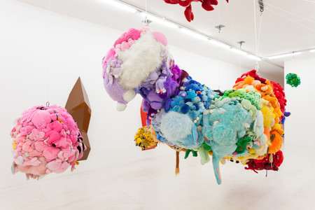 Mike Kelley. Deodorized Central Mass with Satellites. 1991/1999. Plush toys sewn over wood and wire frames with styrofoam packing material, nylon rope, pulleys, steel hardware and hanging plates, fiberglass, car paint, and disinfectant; overall dimensions variable. The Museum of Modern Art, New York. Partial gift of Peter M. Brant, courtesy the Brant Foundation, Inc. and gift of The Sidney and Harriet Janis Collection (by exchange), Mary Sisler Bequest (by exchange), Mr. and Mrs. Eli Wallach (by exchange), The Jill and Peter Kraus Endowed Fund for Contemporary Acquisitions, Anne and Joel Ehrenkranz, Mimi Haas, Ninah and Michael Lynne, and Maja Oeri and Hans Bodenmann