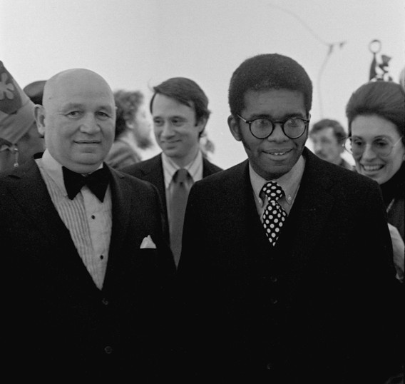 From left, Romare Bearden, John B. Hightower (background center), and Richard Hunt at the opening of the exhibitions Romare Bearden: The Prevalance of Ritual and The Sculpture of Richard Hunt (both March 25–June 9, 1971)