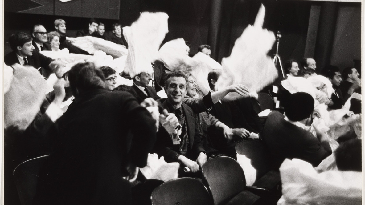 Benjamin Patterson. Audience members participating in Paper Piece (1960), performed during Fluxus Festival/Theatre Compositions/Street Compositions/Exhibits/Electronic Music, Hypokriterion Theater, Amsterdam, June 23, 1963. 1963. Gelatin silver print, image: 7 1/4 × 9 15/16&#34; (18.4 × 25.3 cm); sheet: 7 1/2 × 9 15/16&#34; (19 × 25.3 cm). The Gilbert and Lila Silverman Fluxus Collection Gift