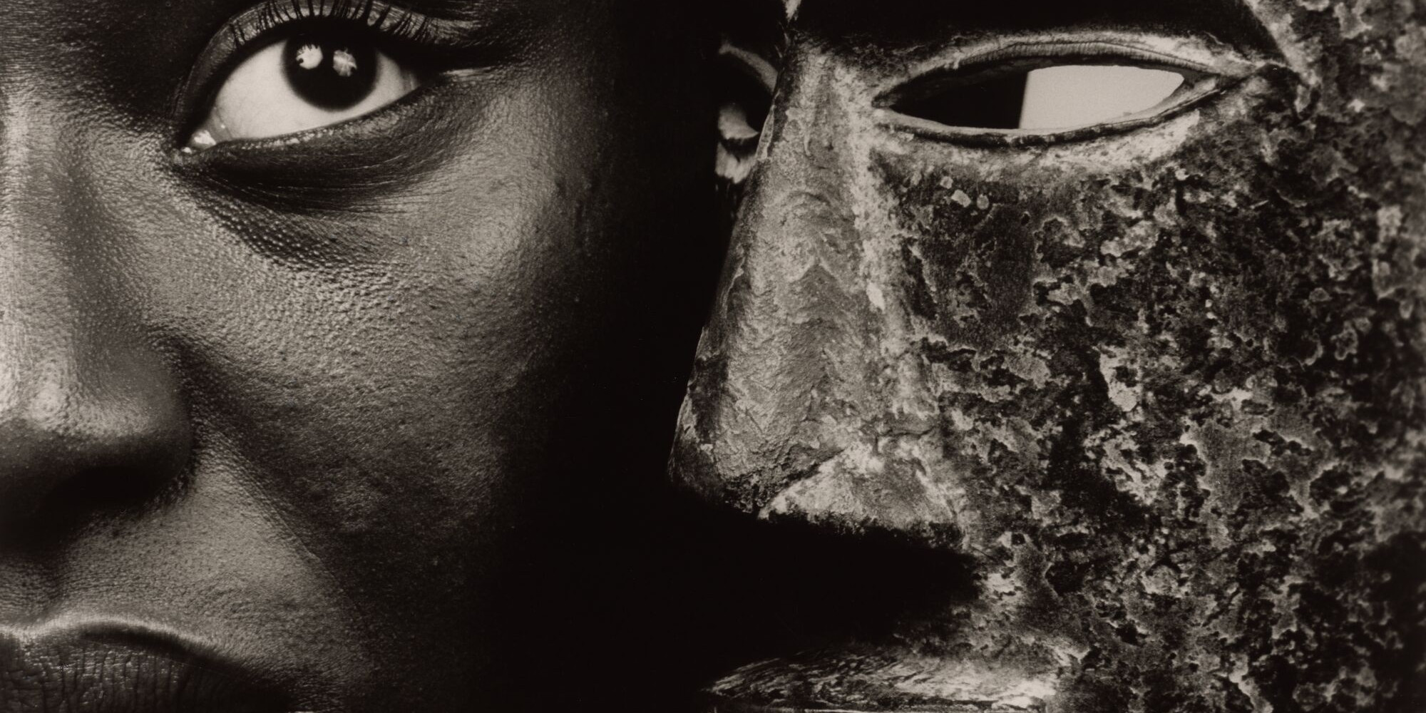 Angèle Etoundi Essamba. Héritage 2 from the series Masks. 1999. Gelatin silver print, 15 × 18 7/16&#34; (38.1 × 46.8 cm). The Museum of Modern Art, New York. Committee on Photography Fund. © 2024 Angèle Etoundi Essamba