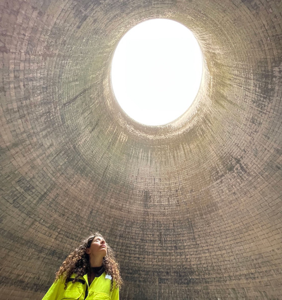 Production still from film shoot inside the cooling tower of Fiddler’s Ferry, a decommissioned coal-fired power station, 2021
