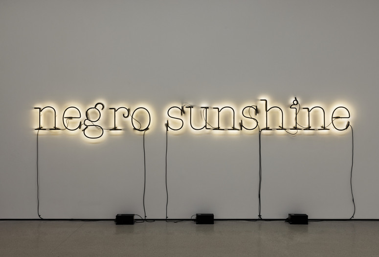 Glenn Ligon. Warm Broad Glow. 2005. Neon and blackout paint, 26&#34; × 16&#39; (66 × 487.7 cm). Bequest of Janice H. Levin (by exchange). © 2024 Glenn Ligon