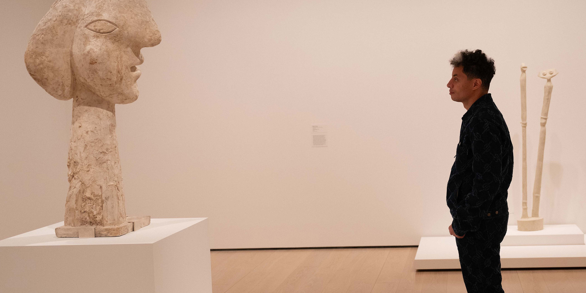 José James at MoMA. Photo: Naeem Douglas. Shown: Pablo Picasso. Head of a Woman. Boisgeloup, 1932. Plaster, 52 1/2 × 25 5/8 × 28" (133.4 × 65 × 71.1 cm). The Museum of Modern Art, New York. Gift of Jacqueline Picasso in honor of the Museum’s continuous commitment to Pablo Picasso’s art. © 2024 Estate of Pablo Picasso/Artists Rights Society (ARS), New York