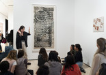 Photo: Martin Seck Image description: Families look at Soho Sidewalk by Sari Dienes during a Family Gallery Talk
