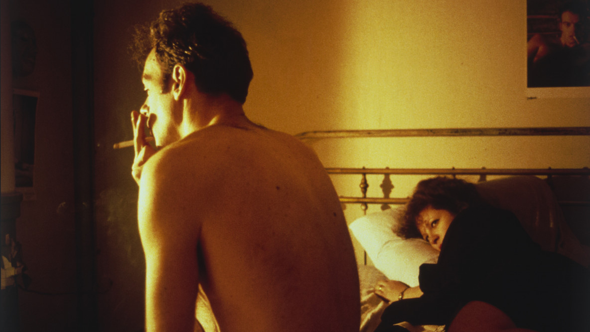 Nan Goldin. Nan and Brian in Bed, New York City. 1983. Silver dye bleach print, printed 2006, 15 1/2 × 23 3/16&#34; (39.4 × 58.9 cm). Acquired through the generosity of Jon L. Stryker. © 2024 Nan Goldin