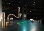 Installation view, Nour Mobarak: Dafne Phono. 2023. Pleurotus citrinopileatus and Trametes versicolor mycelium, wood, plaster, PET plastic, silicone, steel, vacuum, hole, 4 3/8 × 2 3/4&#34; (11 × 7 cm); 15-channel sound, single-channel video, 21:44 min. Courtesy the artist and Sylvia Kouvali, London/Piraeus
