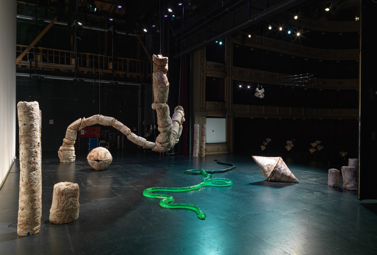 Installation view, Nour Mobarak: Dafne Phono. 2023. Pleurotus citrinopileatus and Trametes versicolor mycelium, wood, plaster, PET plastic, silicone, steel, vacuum, hole, 4 3/8 × 2 3/4" (11 × 7 cm); 15-channel sound, single-channel video, 21:44 min. Courtesy the artist and Sylvia Kouvali, London/Piraeus