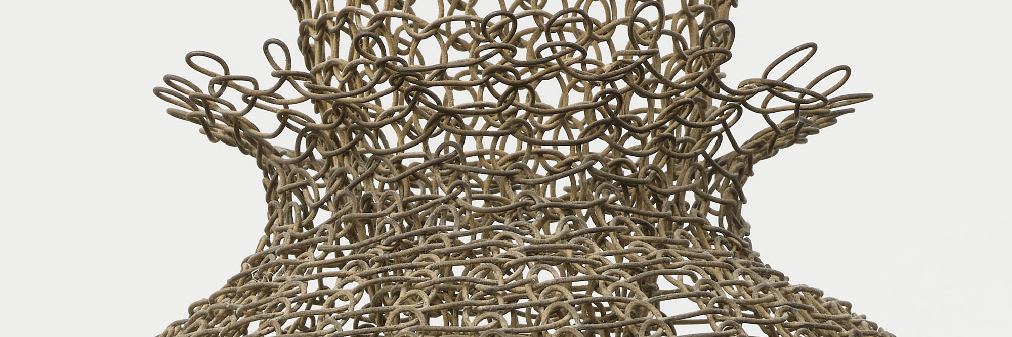 Ruth Asawa. Untitled (S.398, Hanging Eight-Lobed, Four-Part, Discontinuous Surface Form within a Form with Spheres in the Seventh and Eighth Lobes) (detail). c. 1955. Brass wire, iron wire, and galvanized iron wire, 8&#39; 8 1/2&#34; × 14 1/2 × 14 1/2&#34; (265.4 × 36.8 × 36.8 cm). The Museum of Modern Art, New York. Promised gift of Alice and Tom Tisch, 2016. © 2024 Ruth Asawa Lanier, Inc./Artists Rights Society (ARS), New York. Courtesy David Zwirner