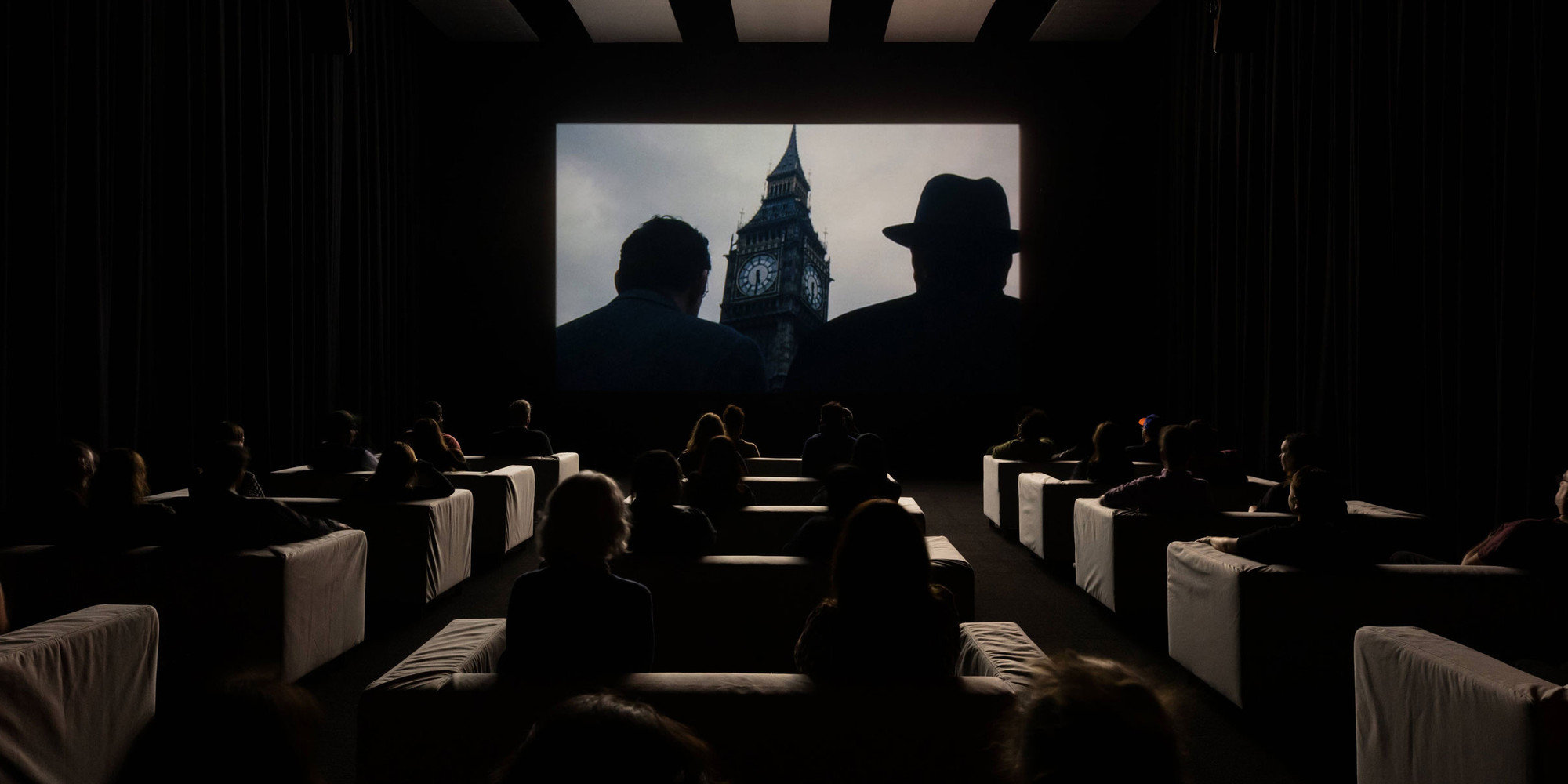 Installation view of Christian Marclay: The Clock, The Museum of Modern Art, New York, November 10, 2024–February 17, 2025. Photo: Jonathan Dorado. Shown: Christian Marclay. Still from The Clock. 2010. Video (black and white and color, sound), 24 hrs. The Museum of Modern Art, New York. Promised gift from the Collection of Jill and Peter Kraus. © 2025 Christian Marclay. Courtesy Paula Cooper Gallery, New York
