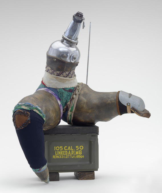 John Outterbridge. Broken Dance, Ethnic Heritage Series. c. 1978–82. Stainless steel, wood, leather, sewn cloth, and ammunition box