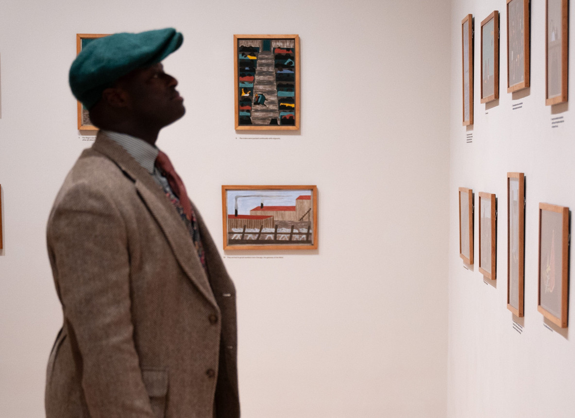 Dandy Wellington with works from Jacob Lawrence’s The Migration Series