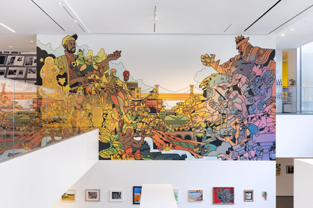 Photo of the mural The Sumptuous Discovery of Gotham a Go-Go by Victor A. Saint-Hilaire (VASH), DonChristian Jones, Public Assistants with students from Academy of American Studies, H.E.R.O. High (Health, Education, and Research Occupations High School), and New World High School.